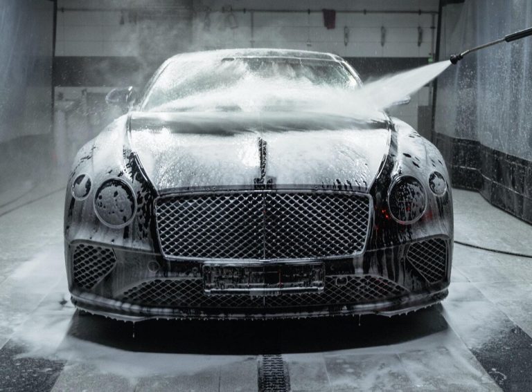 a person washing a car